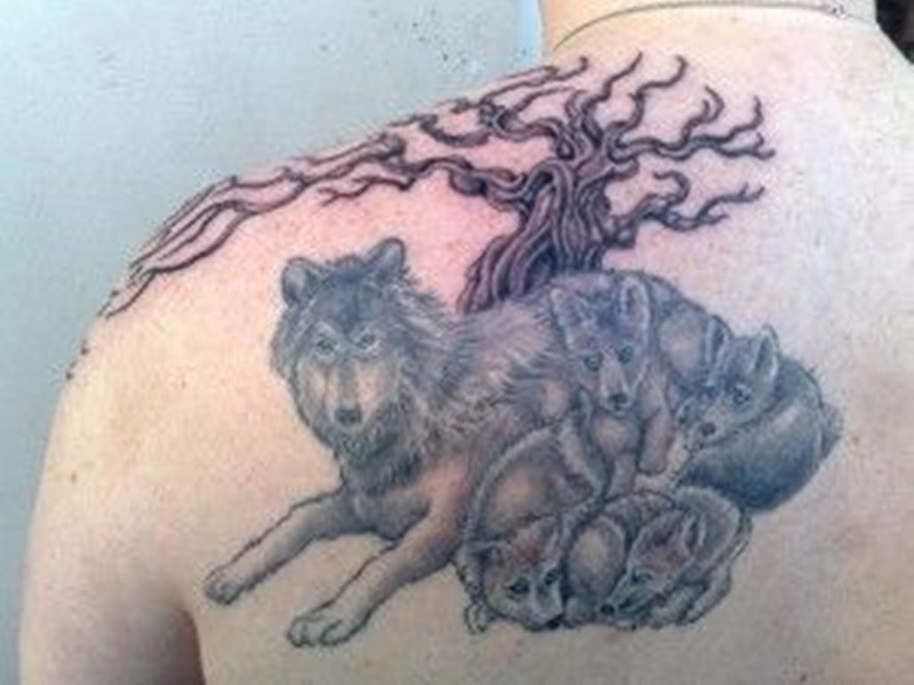 Wolf cub tattoo #EdisonHuerfanoTattoo #wolftattoo #tattoowolf #wolfcub  #tattoist #worldart #tattooworld #animalart #t… | Cubs tattoo, Puppy tattoo,  Wolf pack tattoo